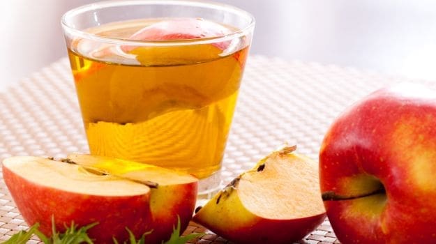 Les bienfaits du vinaigre de cidre pour prendre soin de vos cheveux pendant la grossesse : les conseils de Naturelle Maman